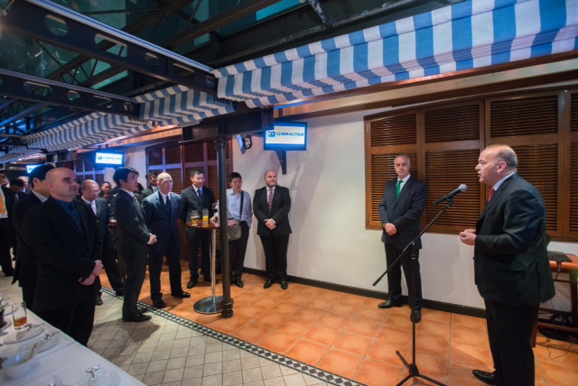 Minister Isola talking to guests at Ministerial Reception in Hong Kong