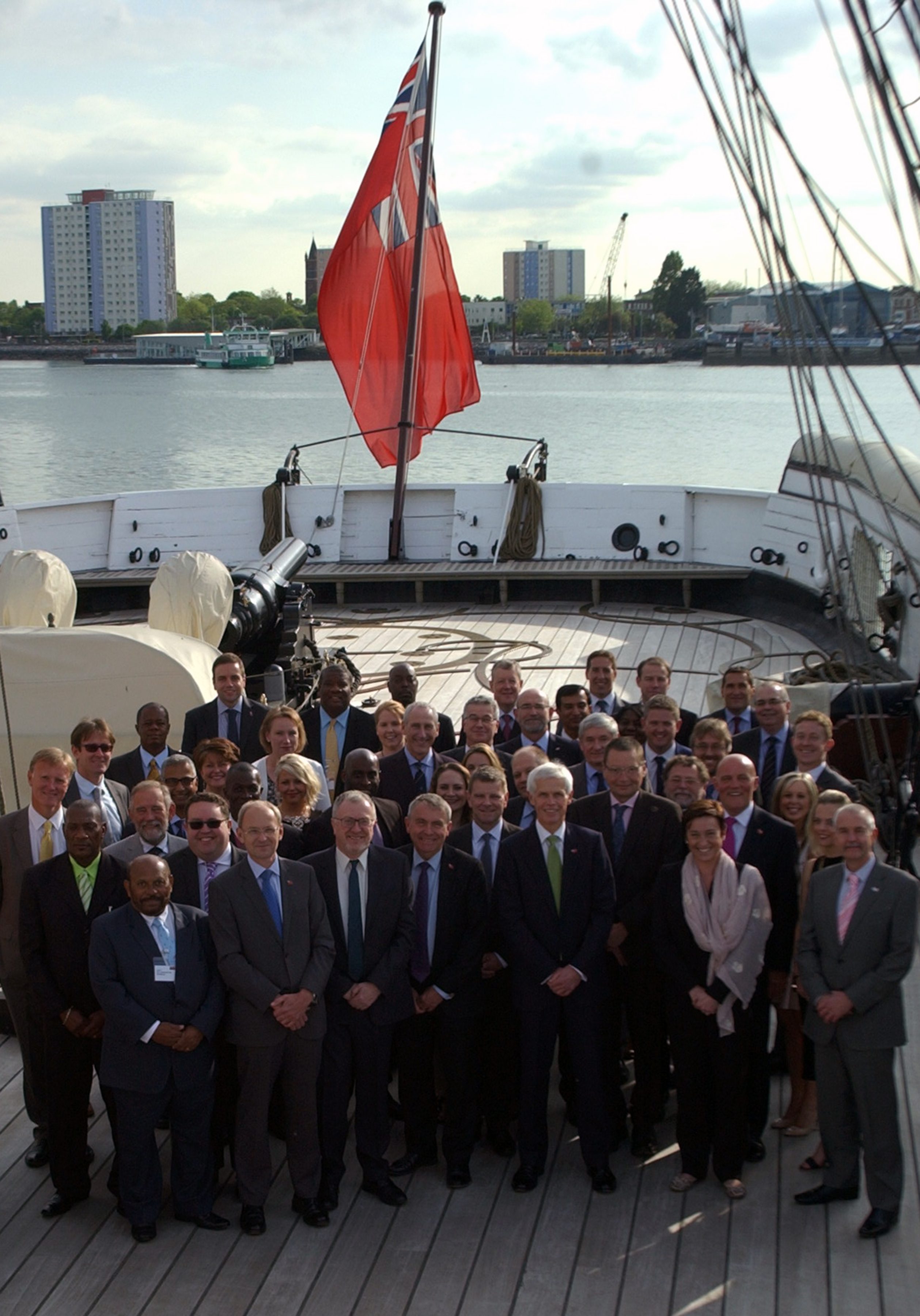 REG delegates on the stern of HMS Warrior