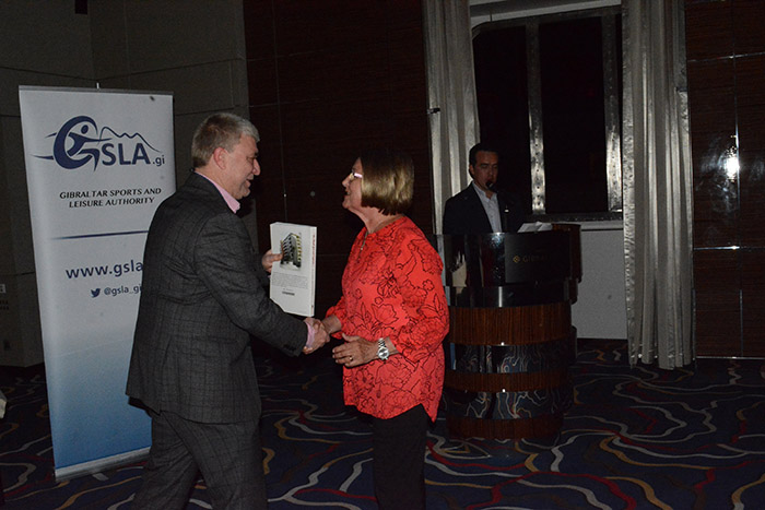 Minister for Sport, the Hon Steven Linares presents a memento to Cheryl Danson, Secretary of Netball Europe, at the Sunborn Reception Minister for Sport, the Hon Steven Linares presents a memento to Cheryl Danson, Secretary of Netball Europe, at the Sunborn Reception