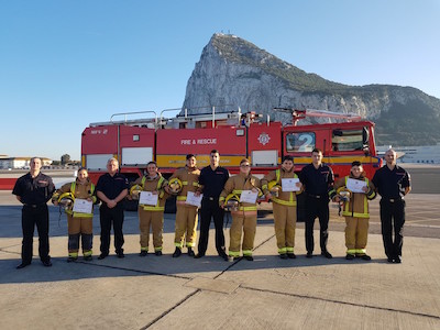 Candidates Callum Ferrary, Gianni Gonzalez, Emma McLaren, Ellie Navarro, Daniel Rodriguez & Alex Sanguinetti proudly showing their certificates alongside their AFRS instructors LFF Shane Macdonald, FF Daniel Cornelio, FF Jonathan Falero, FF Jamie Linares & FF Mitch Mifsud